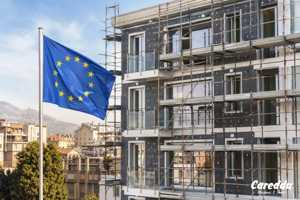 Bandiera UE e cantiere ristrutturazione edilizia Brescia, nuova classe energetica serramenti